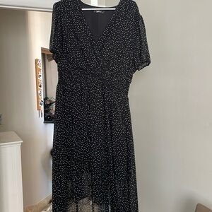 Fashion black dress with white dots with elastic waistband and button detail